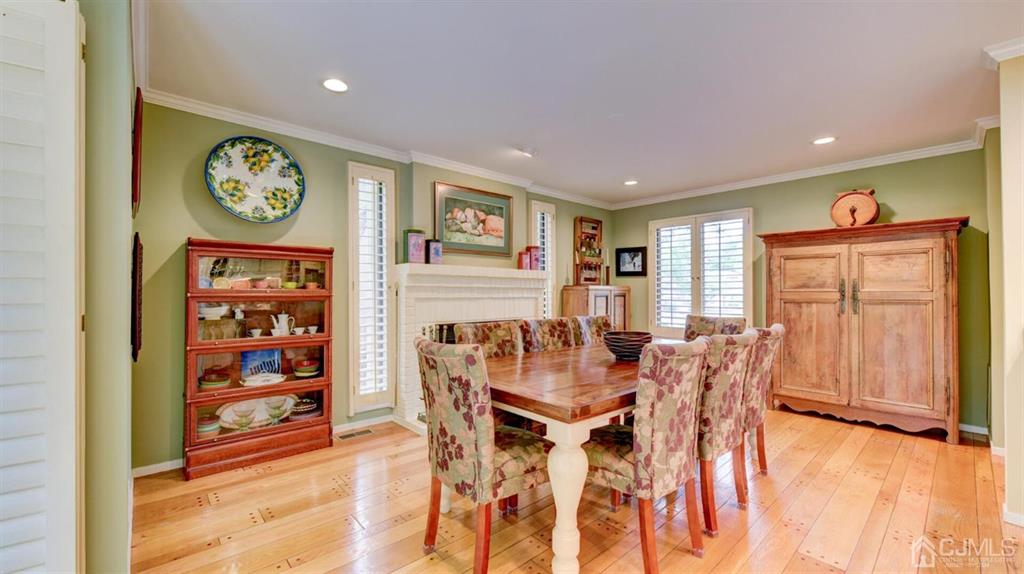 449 Sayre Drive Plainsboro, NJ 08540 - Photo 27 of 58 a view of a dining room with furniture window and wooden floor