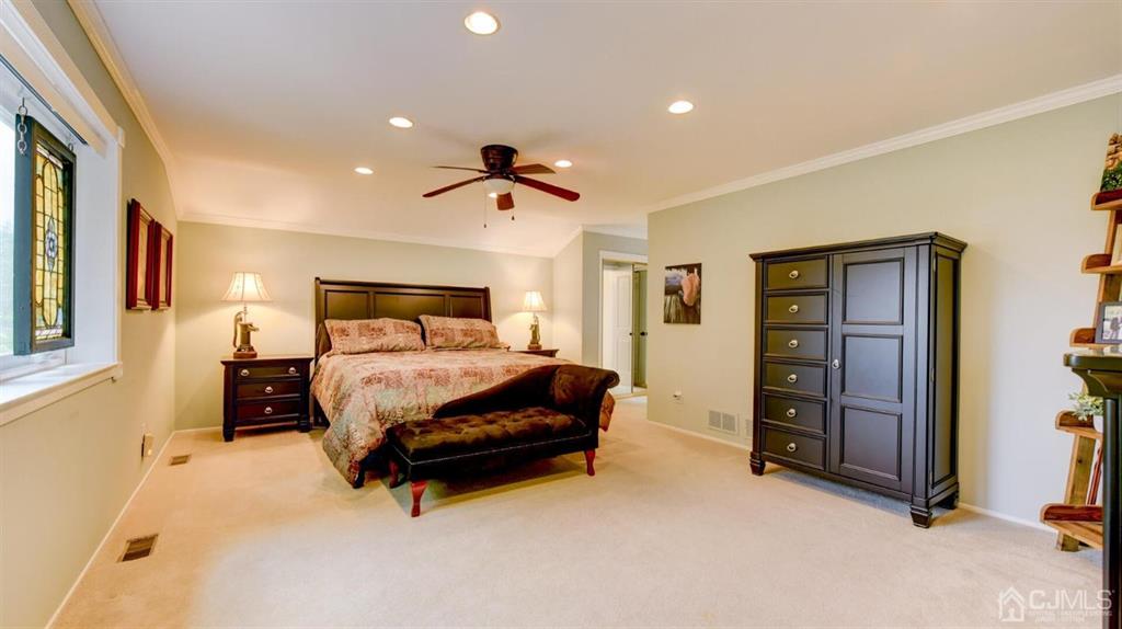 449 Sayre Drive Plainsboro, NJ 08540 - Photo 35 of 58 a bedroom with a bed and a walk in closet