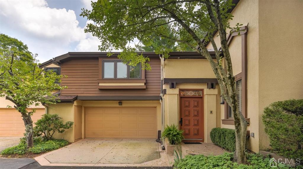 449 Sayre Drive Plainsboro, NJ 08540 - Photo 5 of 58 a front view of a house with garden