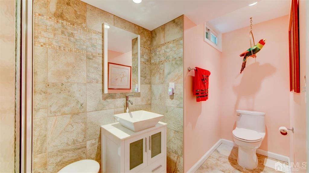 449 Sayre Drive Plainsboro, NJ 08540 - Photo 51 of 58 a bathroom with a sink toilet and shower