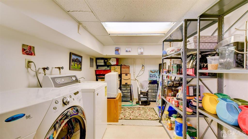 449 Sayre Drive Plainsboro, NJ 08540 - Photo 53 of 58 a view of a storage & utility room with lots of stuff