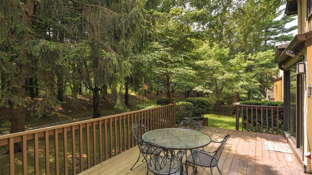 449 Sayre Drive Plainsboro, NJ 08540 - Photo 55 of 58 a view of a balcony with table and chairs