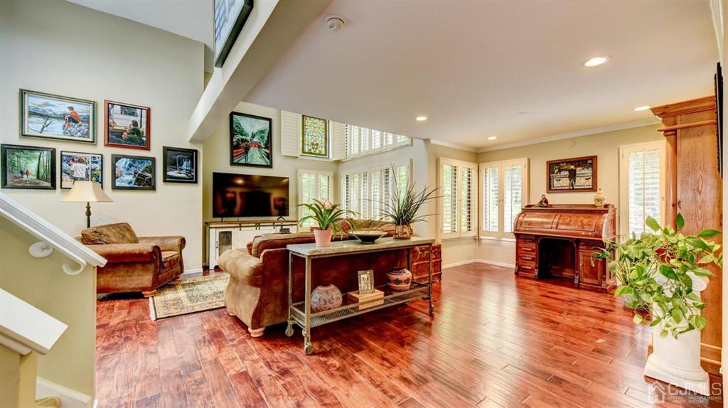 449 Sayre Drive Plainsboro, NJ 08540 - Photo 7 of 58 a living room with fireplace furniture and a flat screen tv