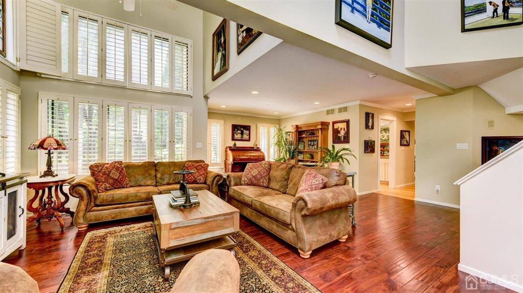 449 Sayre Drive Plainsboro, NJ 08540 - Photo 9 of 58 a living room with furniture wooden floor and a large window