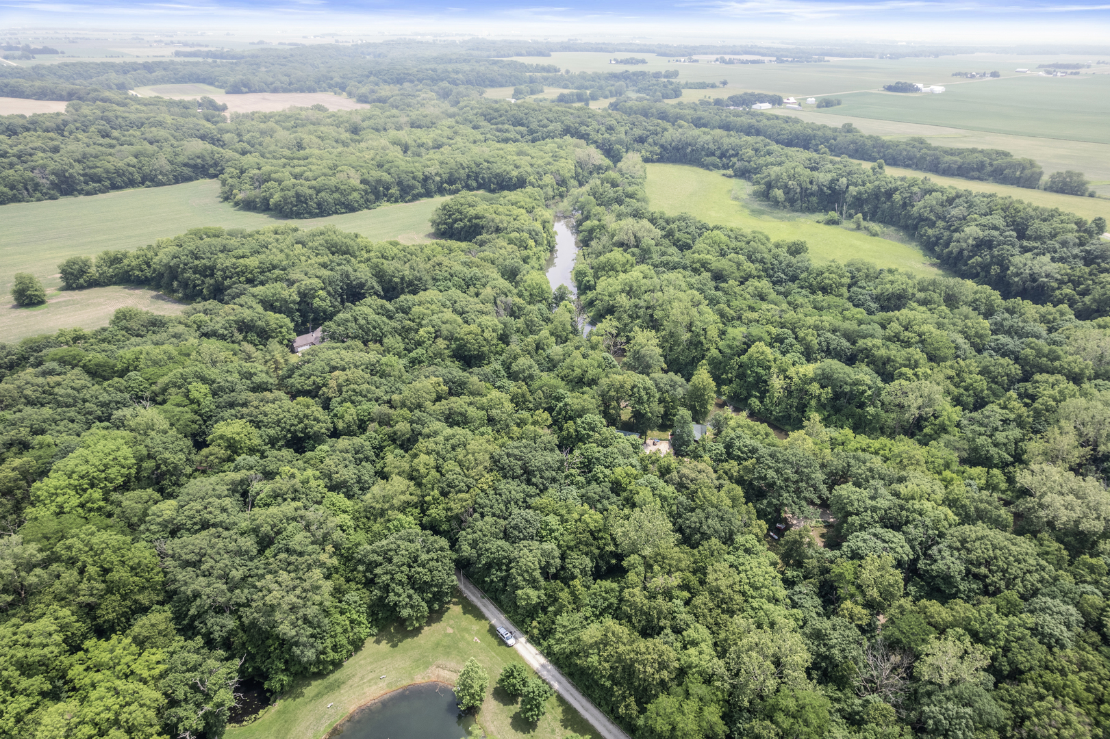 4006 East 1950th Road Sheridan, IL 60551 - Photo 22 of 26 an aerial view of residential houses with outdoor space and trees