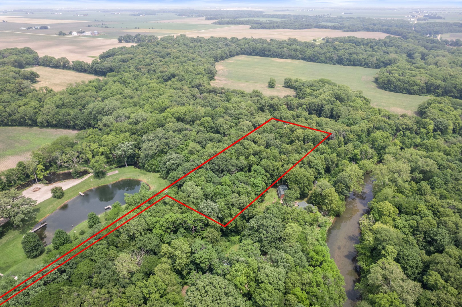 4006 East 1950th Road Sheridan, IL 60551 - Photo 9 of 26 a view of a green yard with a lake view