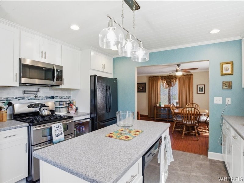 699 Losson Road Cheektowaga, NY 14227 - Photo 11 of 50 Note the pot filler behind the double oven gas ran