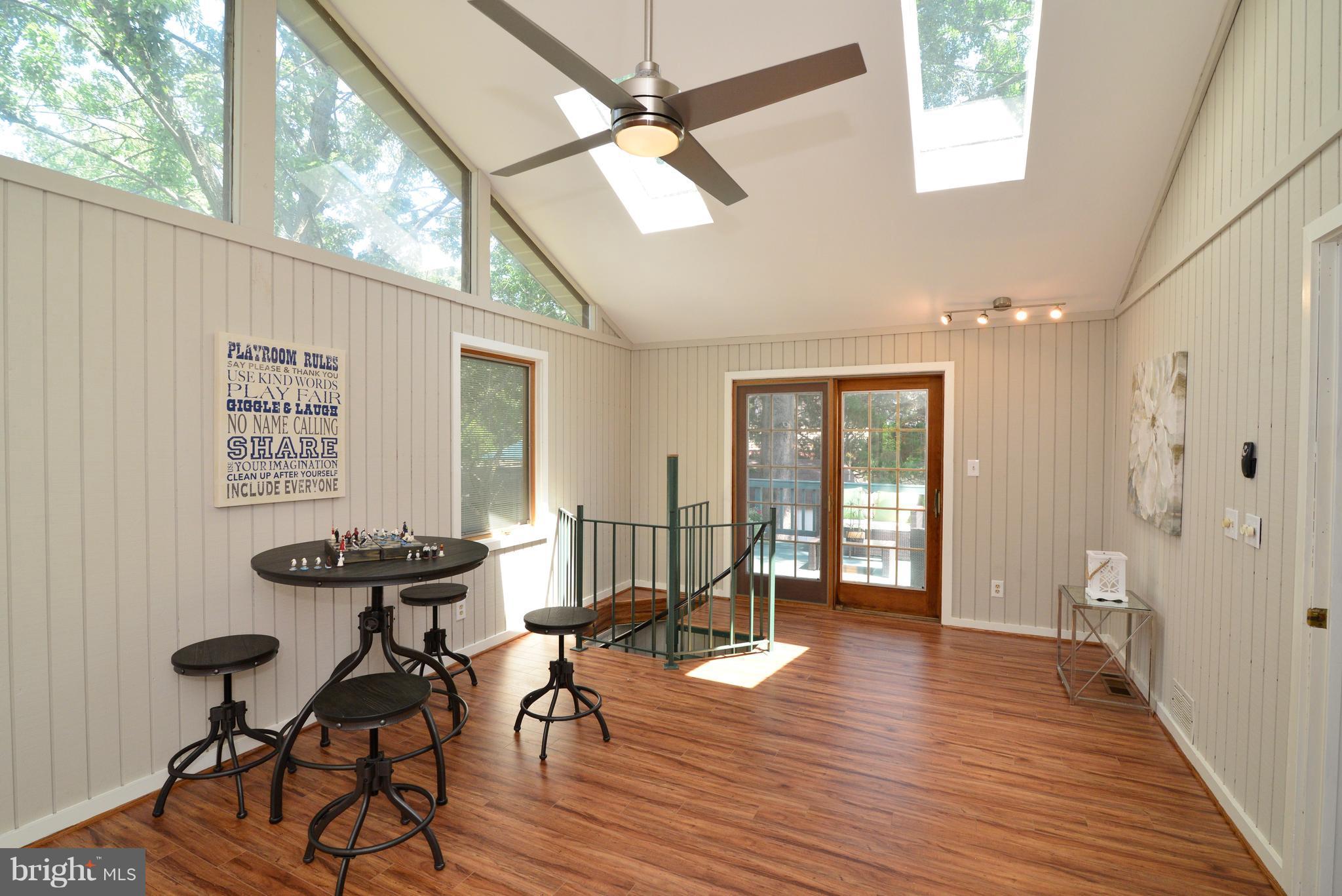 1515 Coat Ridge Road Herndon, VA 20170 - Photo 11 of 30 Great Room with Skylights, Sliding Doors to Deck.