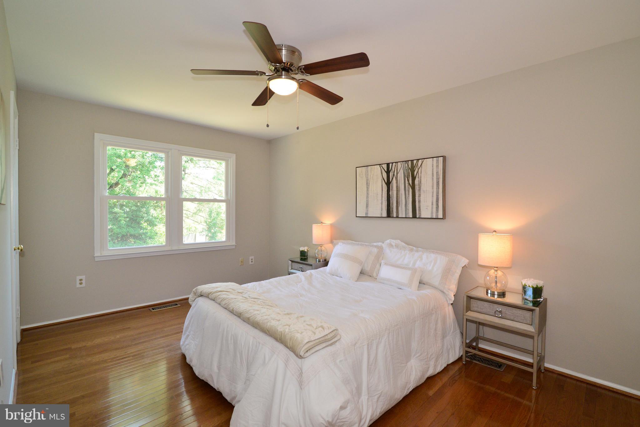 1515 Coat Ridge Road Herndon, VA 20170 - Photo 12 of 30 Master Bedroom w/New Wood Floors, Walk-In Closet.