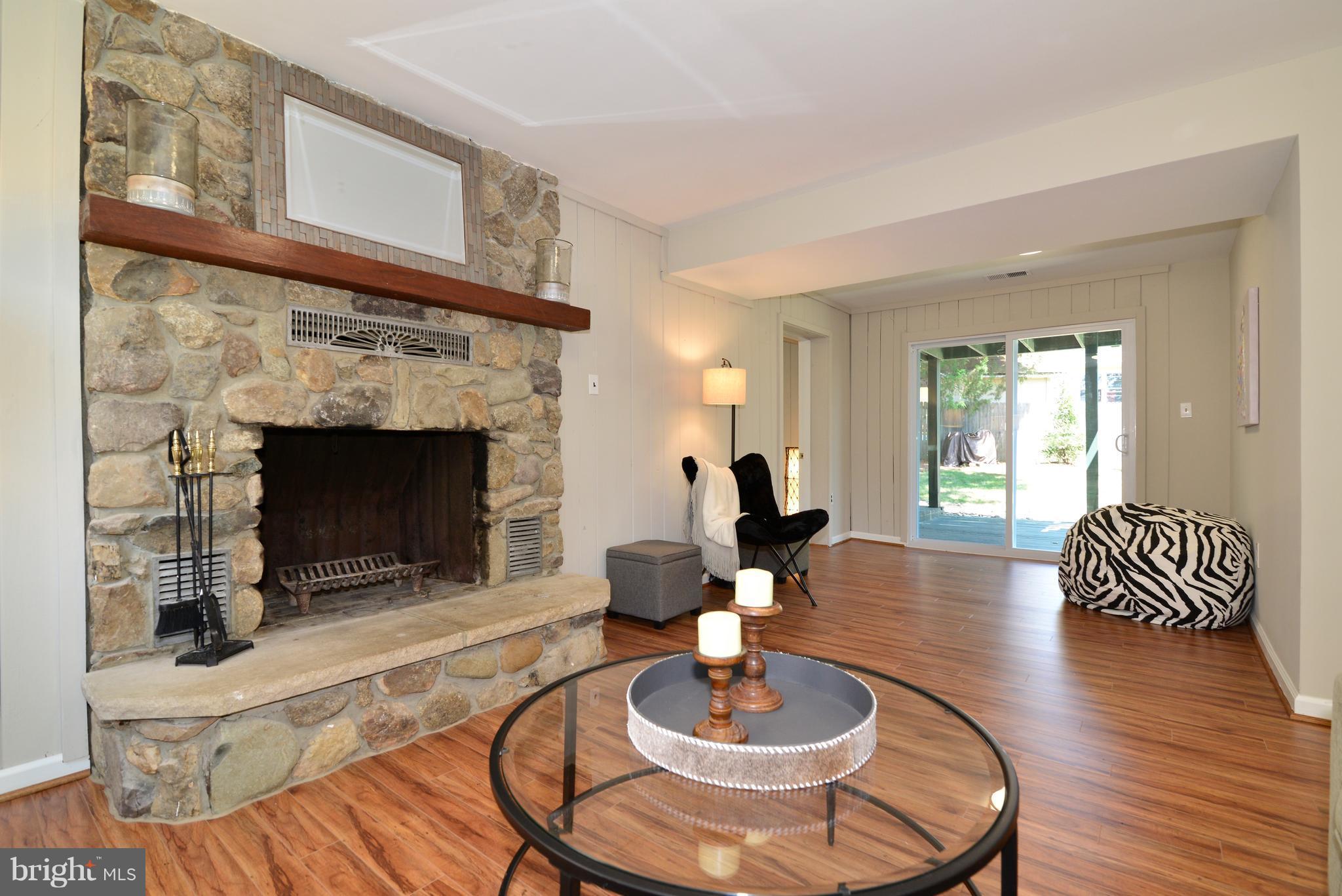 1515 Coat Ridge Road Herndon, VA 20170 - Photo 18 of 30 Cosy Family Room with New Wood Flooring.