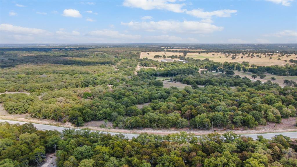 Lot 13 Double B Ranch Road South Perrin, TX 76486 - Photo 25 of 30 a view of a lake with beach and outdoor space