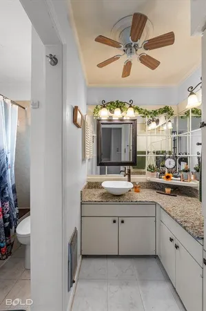 a bathroom with a shower and a toilet