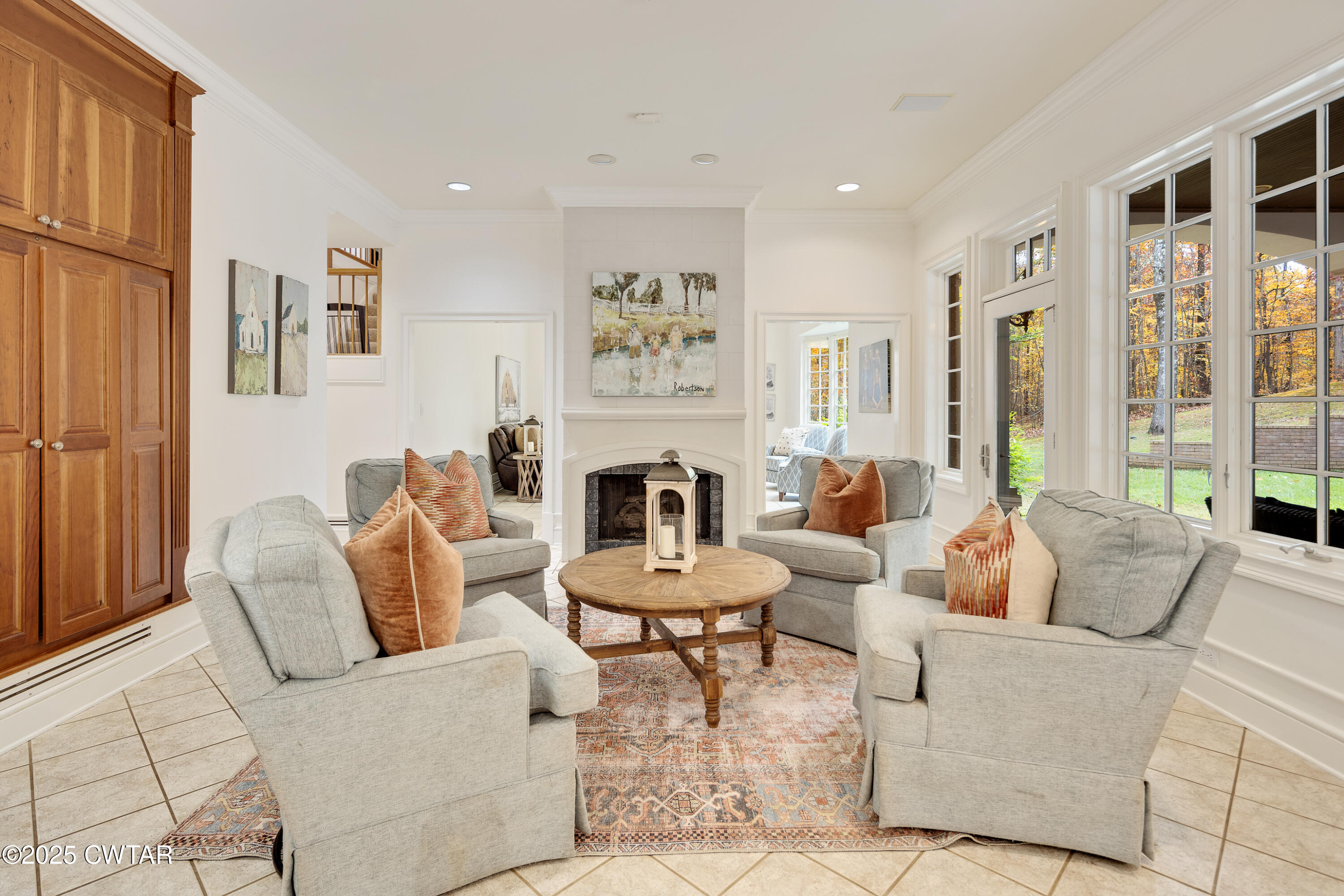 38 Bridlepath Drive Jackson, TN 38305 - Photo 22 of 89 a living room with furniture a fireplace and a large window