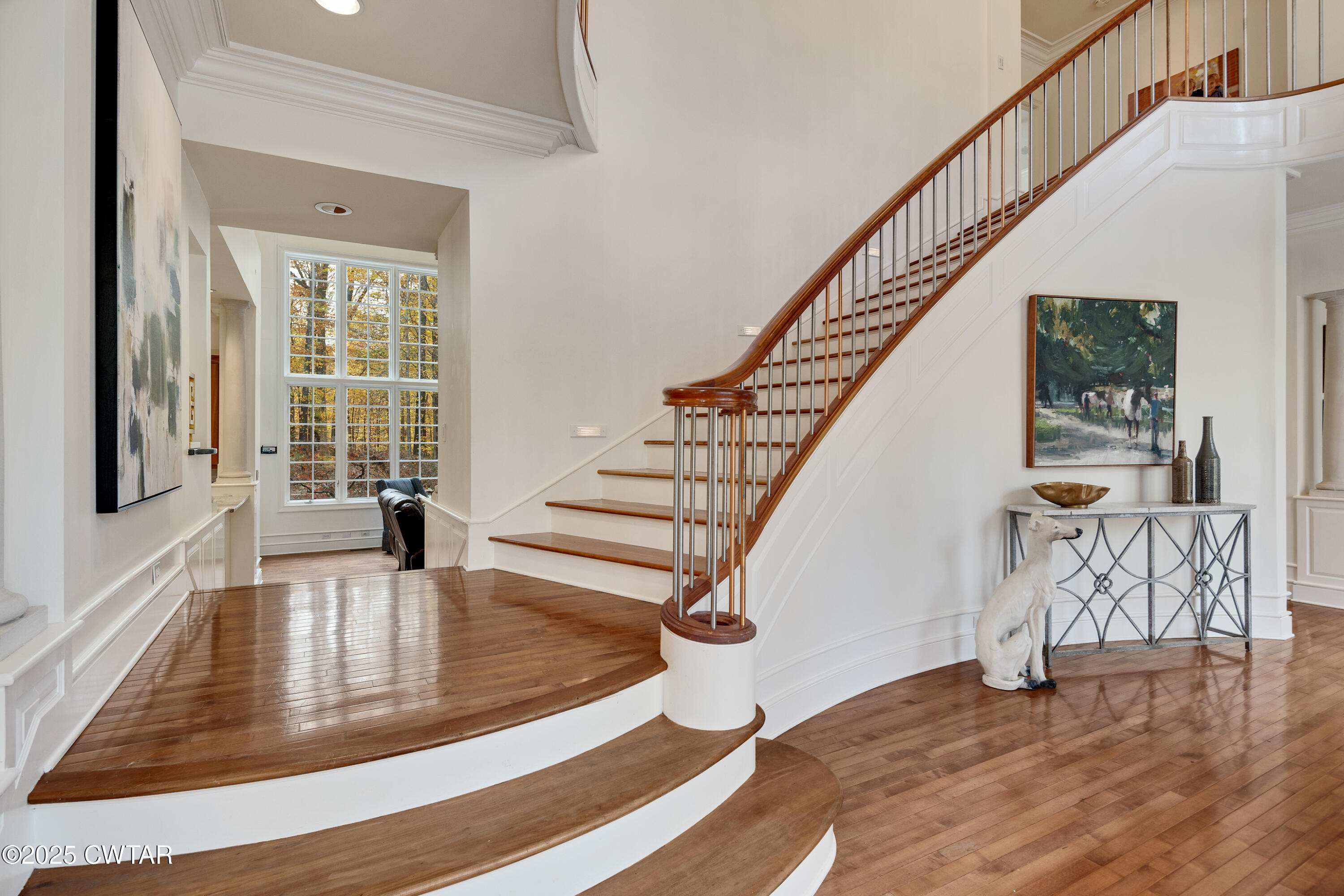 38 Bridlepath Drive Jackson, TN 38305 - Photo 10 of 89 a view of entryway and hall with wooden floor