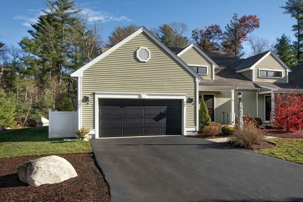 18 Kevin's Way, Unit 18 Scituate, MA 02066 - Photo 22 of 33 a front view of a house with garden
