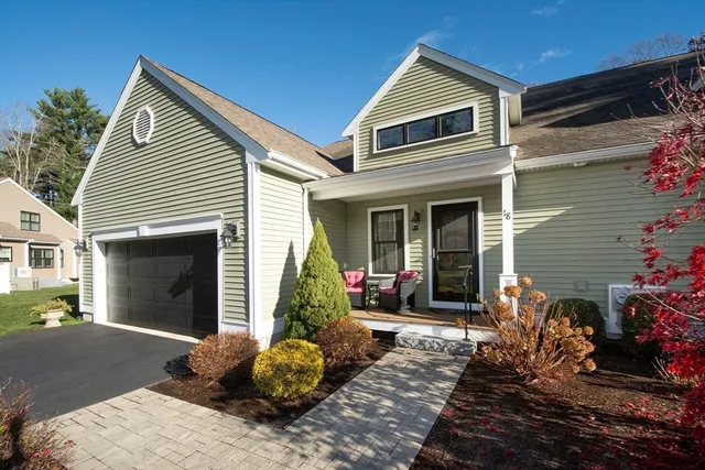 a front view of a house with patio