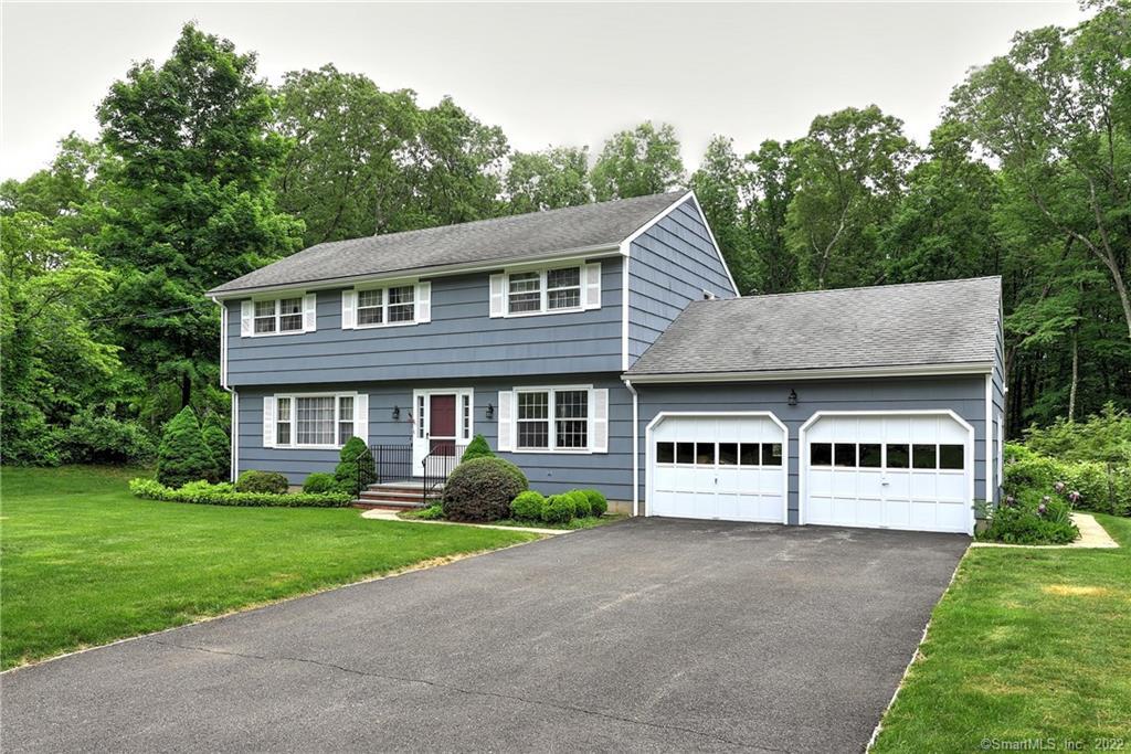 78 Autumn Ridge Road Trumbull, CT 06611 - Photo 1 of 1 a house view with a garden space