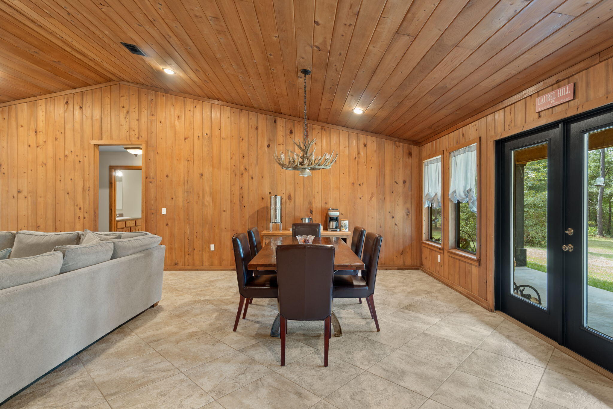 3350 New Ebenezer Road Laurel Hill, FL 32567 - Photo 12 of 53 a view of a dining room with furniture window and outside view