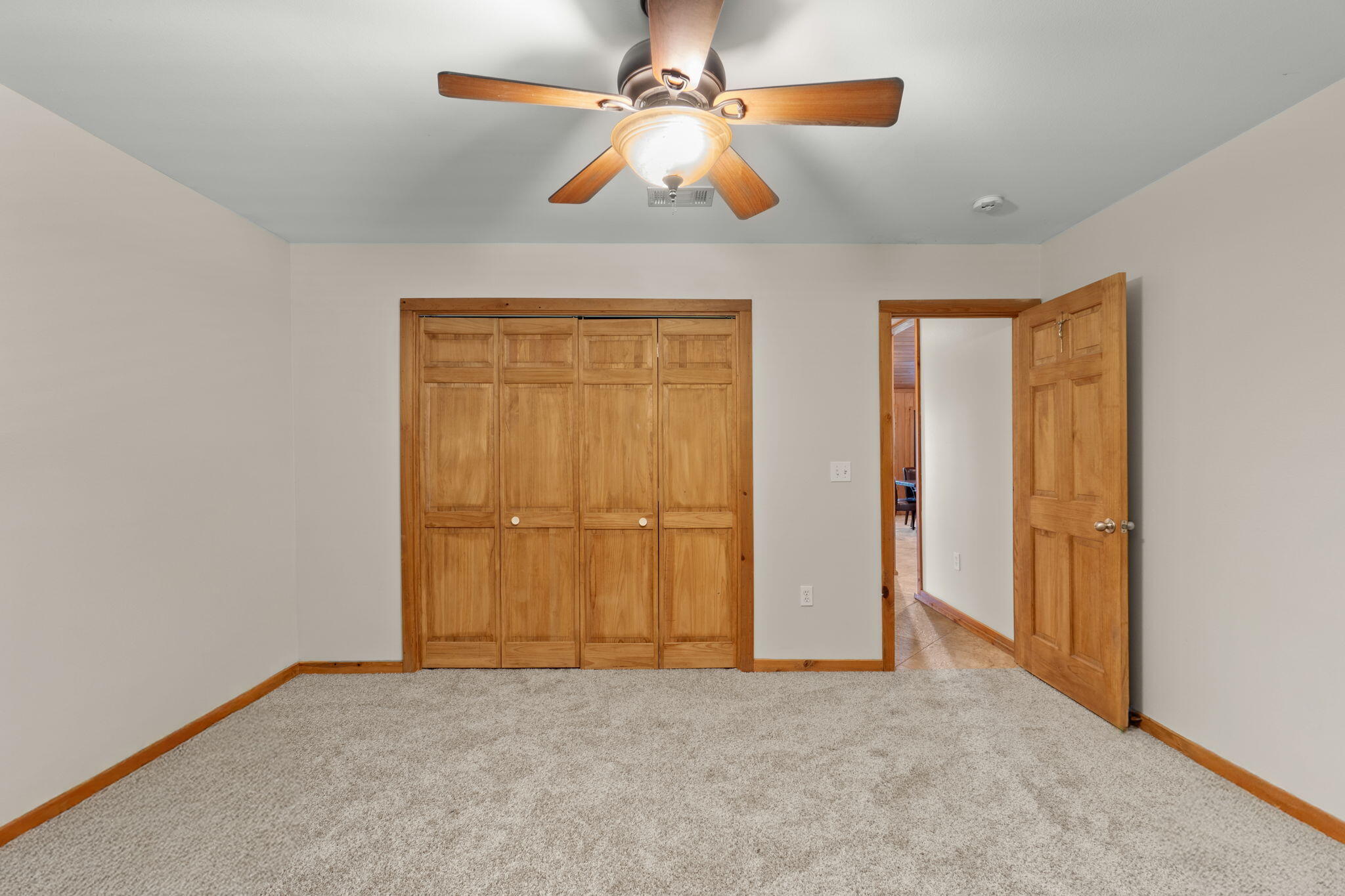 3350 New Ebenezer Road Laurel Hill, FL 32567 - Photo 19 of 53 an empty room with closet and fan
