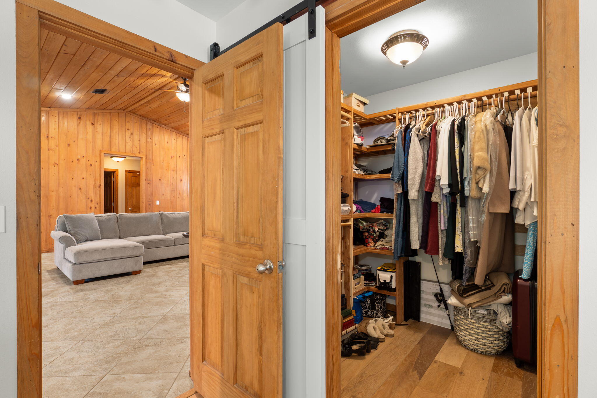 3350 New Ebenezer Road Laurel Hill, FL 32567 - Photo 26 of 53 a view of walk in closet with clothes and shoes