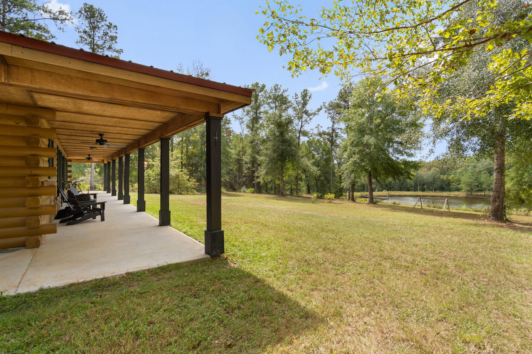 3350 New Ebenezer Road Laurel Hill, FL 32567 - Photo 28 of 53 a view of a patio with swimming pool