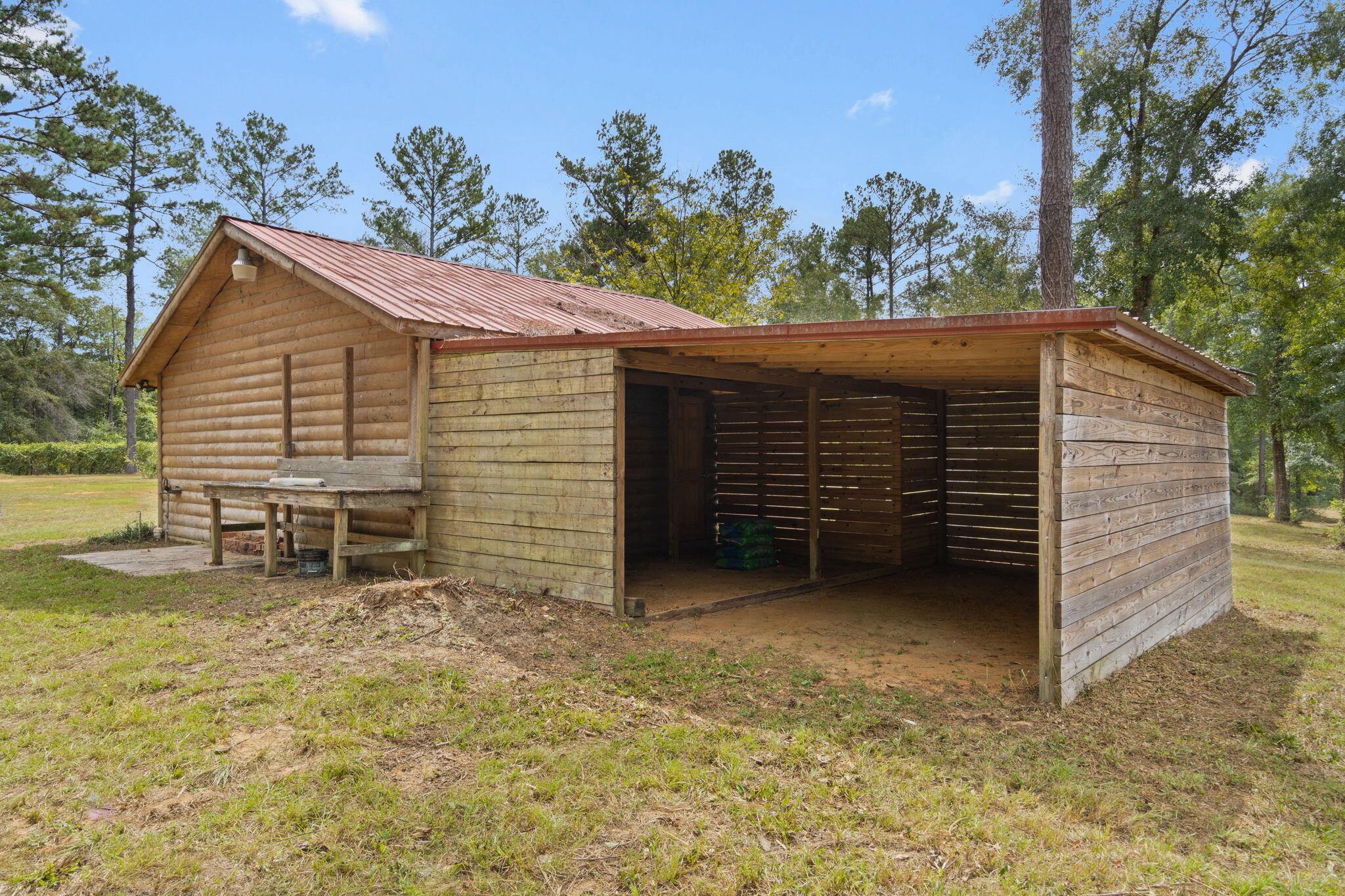 3350 New Ebenezer Road Laurel Hill, FL 32567 - Photo 34 of 53 a view of a house with a yard