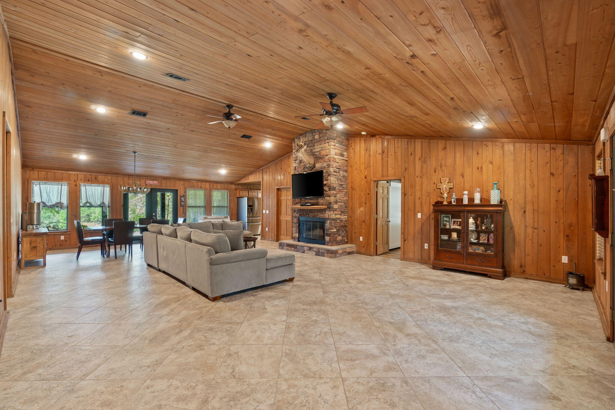 3350 New Ebenezer Road Laurel Hill, FL 32567 - Photo 8 of 53 a living room with furniture and a large window
