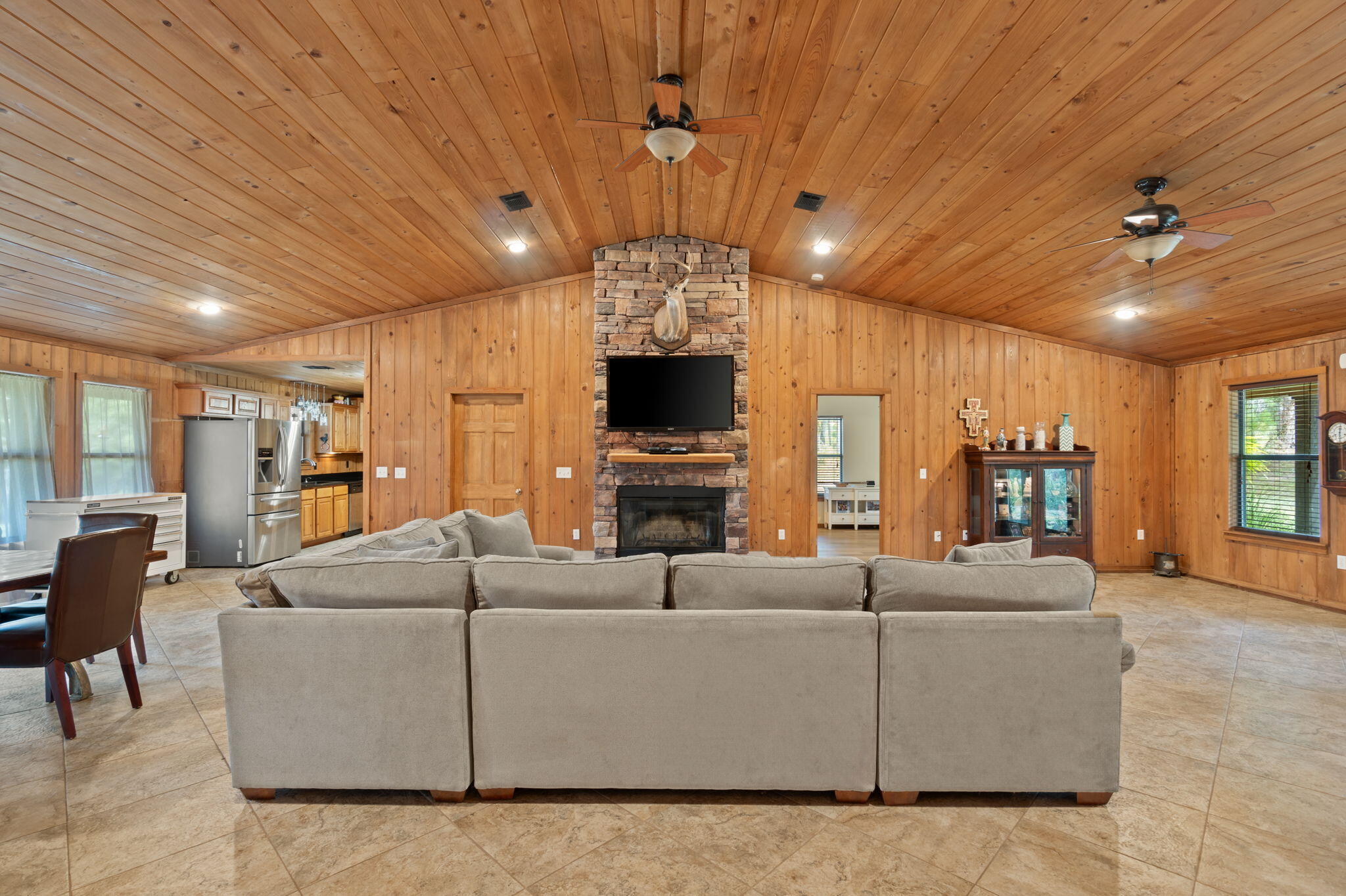 3350 New Ebenezer Road Laurel Hill, FL 32567 - Photo 10 of 53 a living room with fireplace furniture and a chandelier