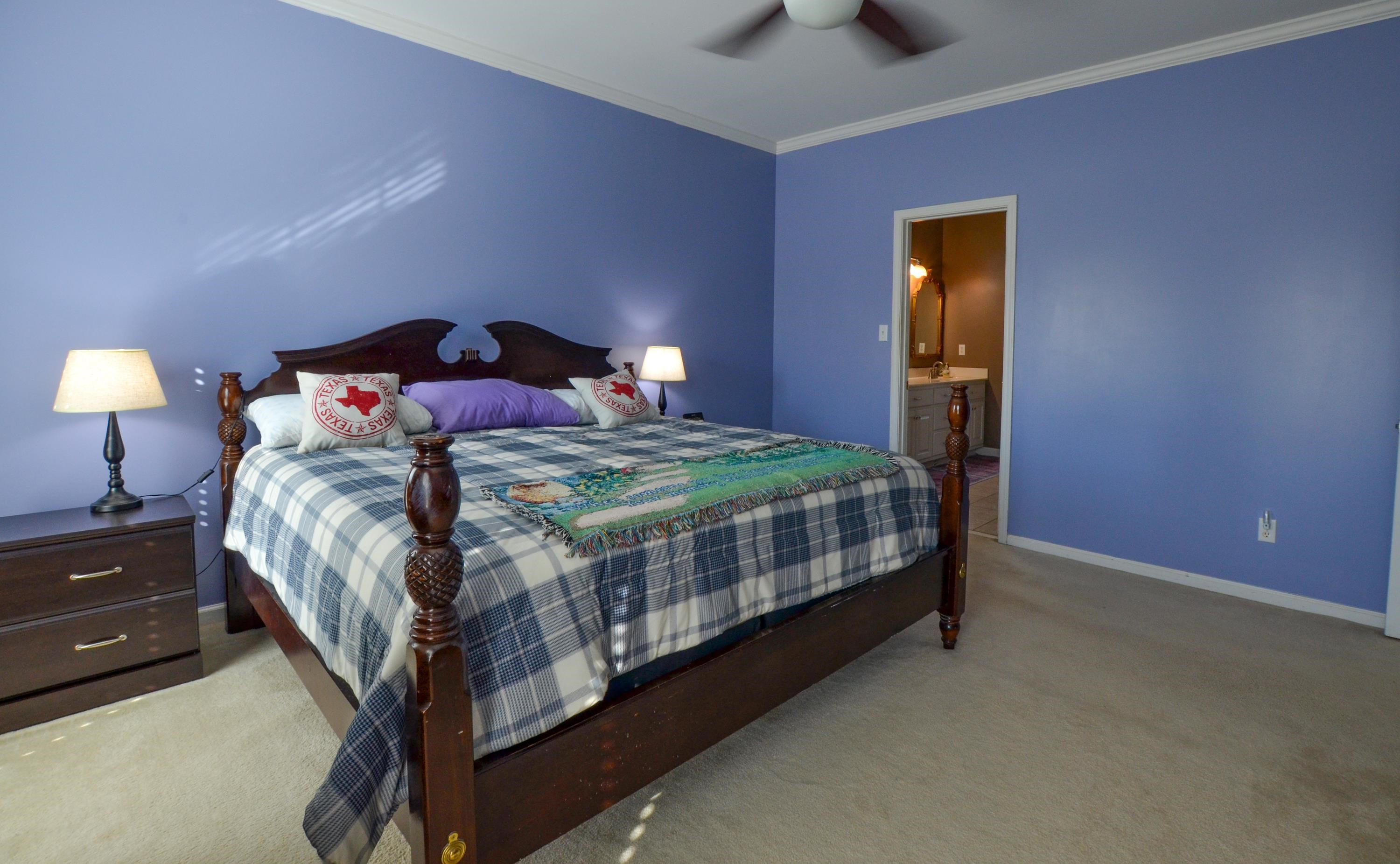 448 Plomar Williams Road Gadsden, TN 38337 - Photo 14 of 28 a bedroom with a bed and a night stand