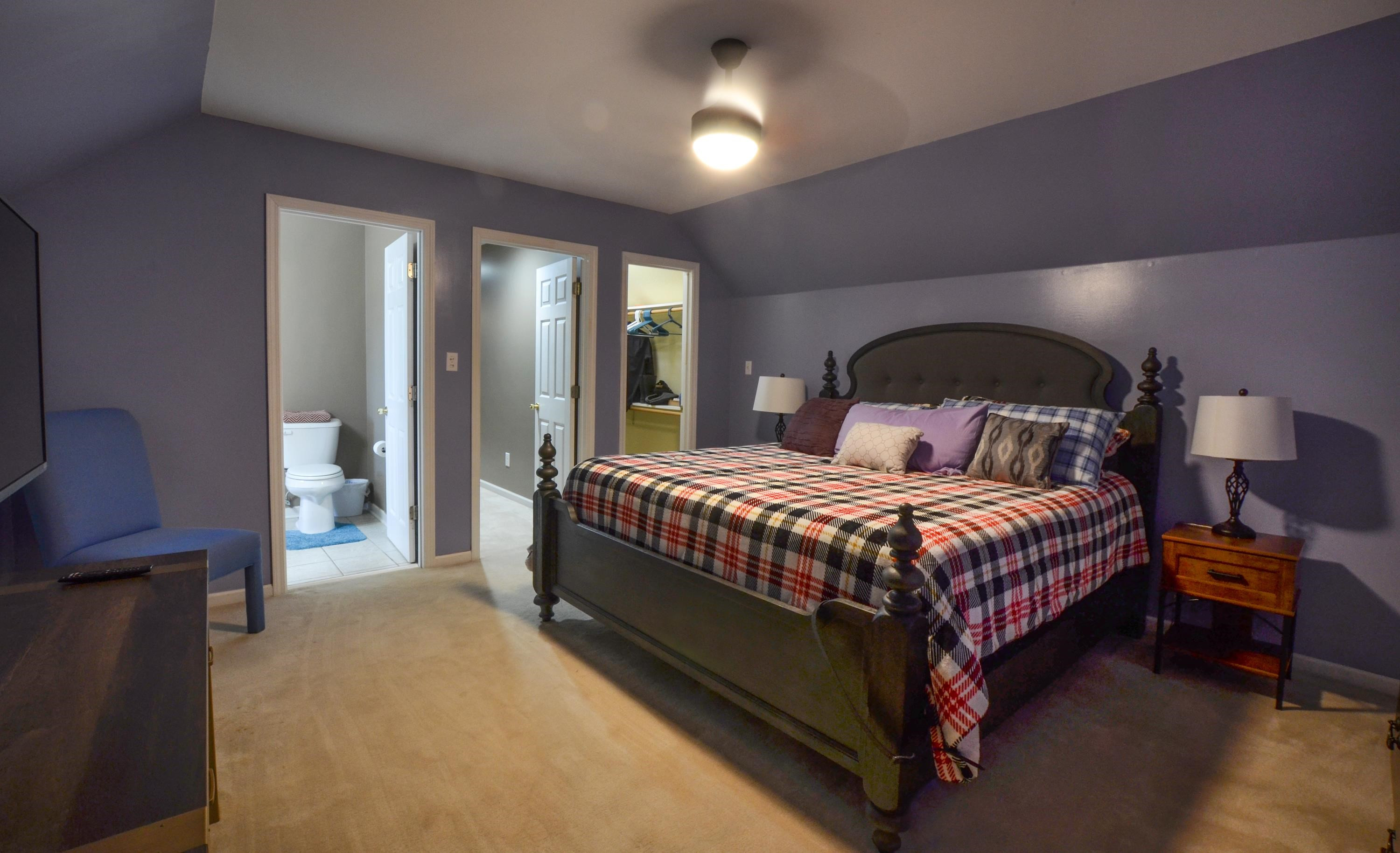 448 Plomar Williams Road Gadsden, TN 38337 - Photo 19 of 28 a bedroom with a bed and a mirror