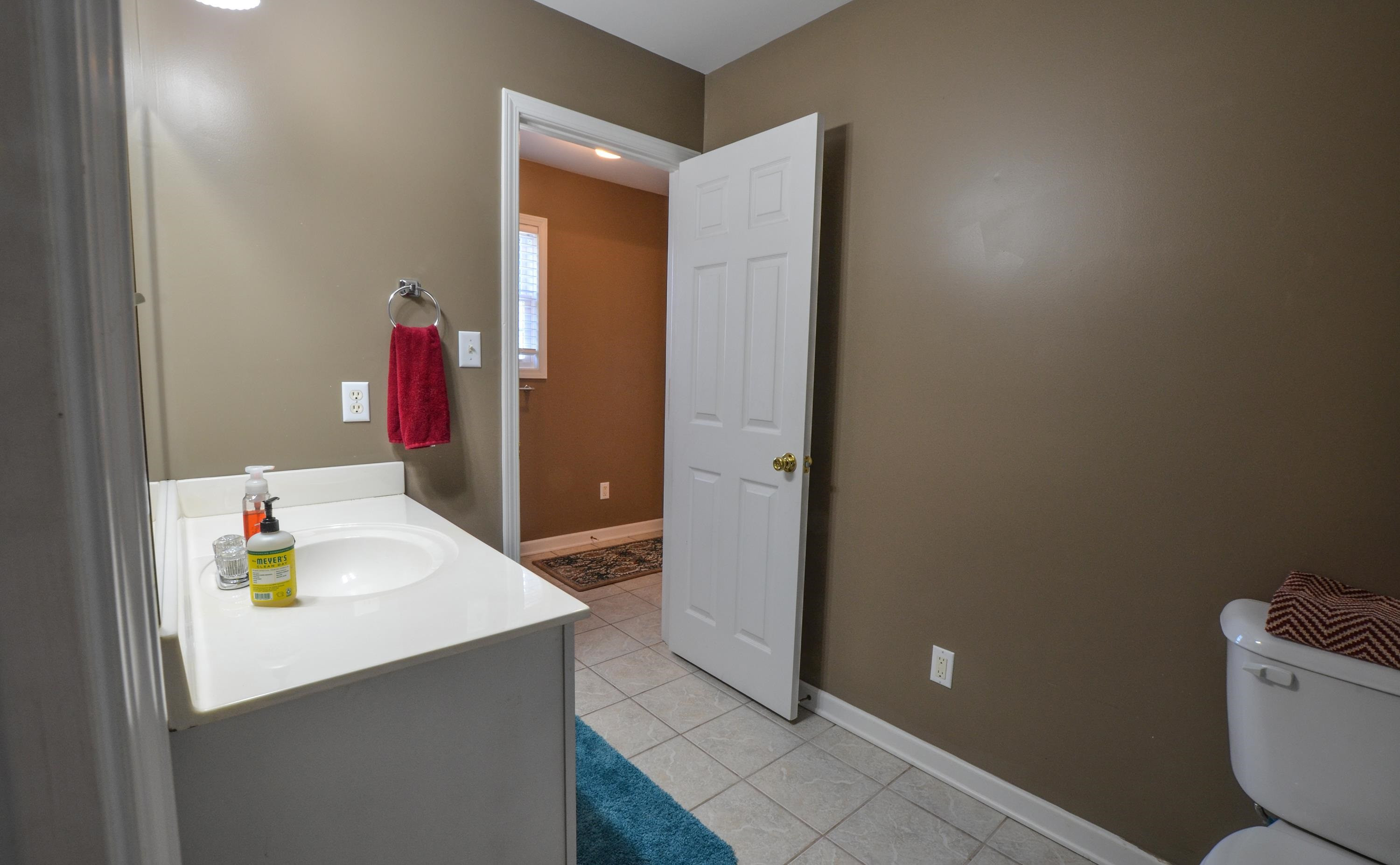 448 Plomar Williams Road Gadsden, TN 38337 - Photo 23 of 28 a bathroom with a sink and a toilet