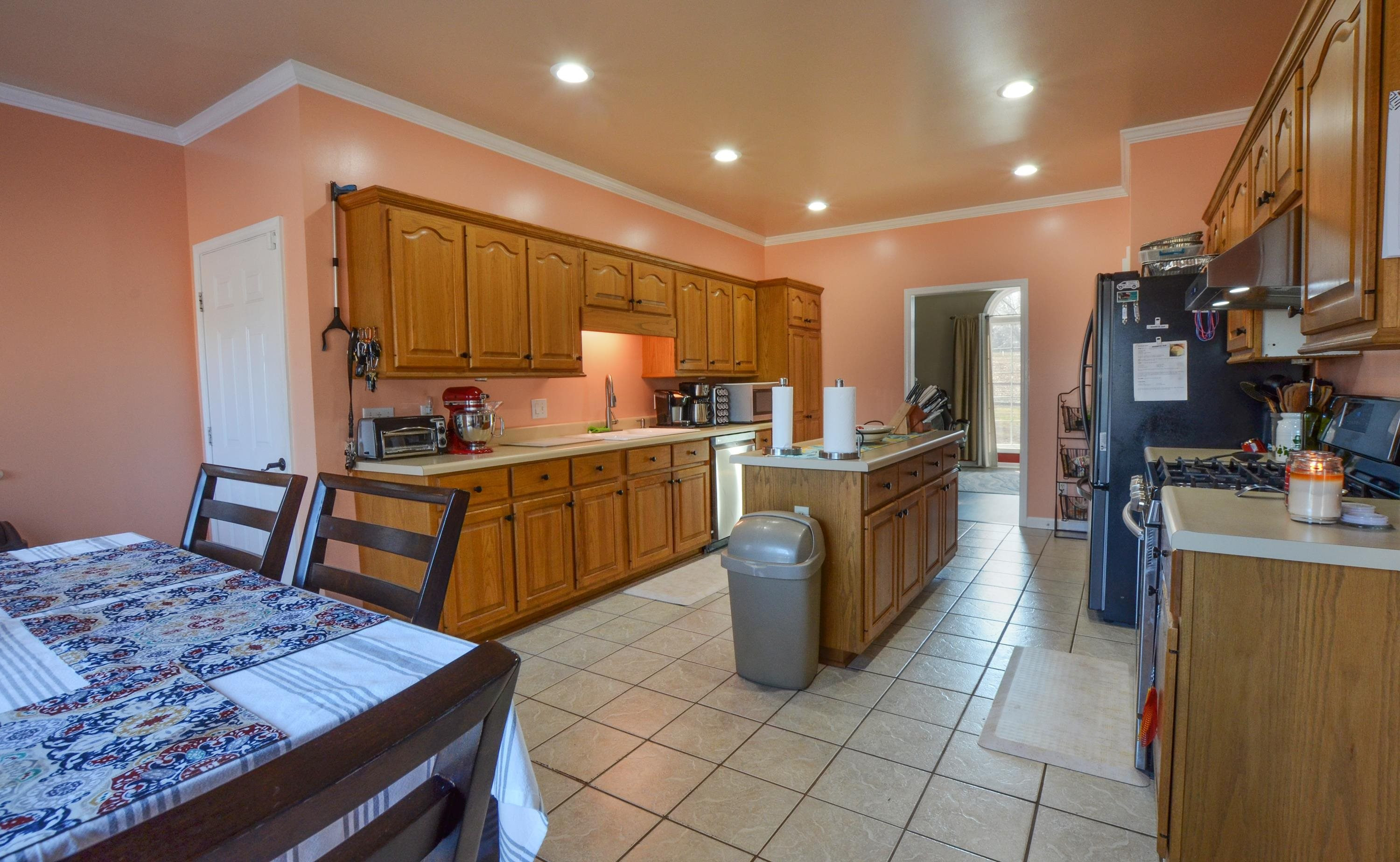 448 Plomar Williams Road Gadsden, TN 38337 - Photo 10 of 28 a kitchen with sink cabinets and window