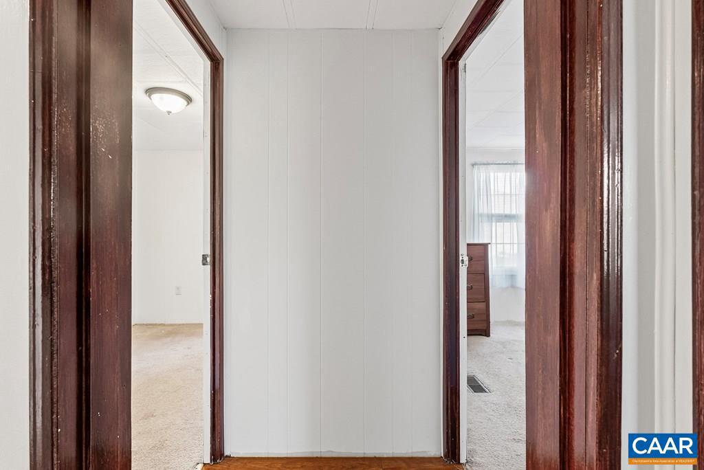 1066 Stevens Cove Road Lovingston, VA 22949 - Photo 22 of 34 a view of a bathroom from a hallway
