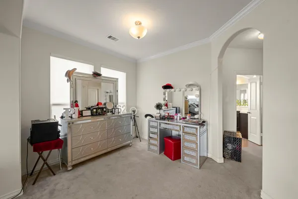 a bathroom with a bathtub sink and a mirror