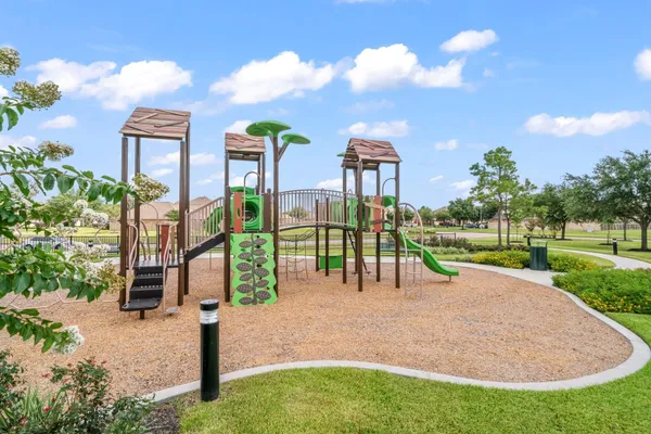 a view of a park with swings