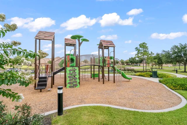 a view of a park with swings