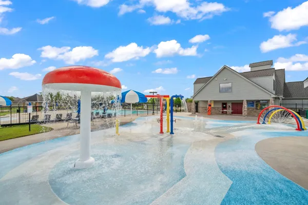 a view of a swimming pool with lounge chair