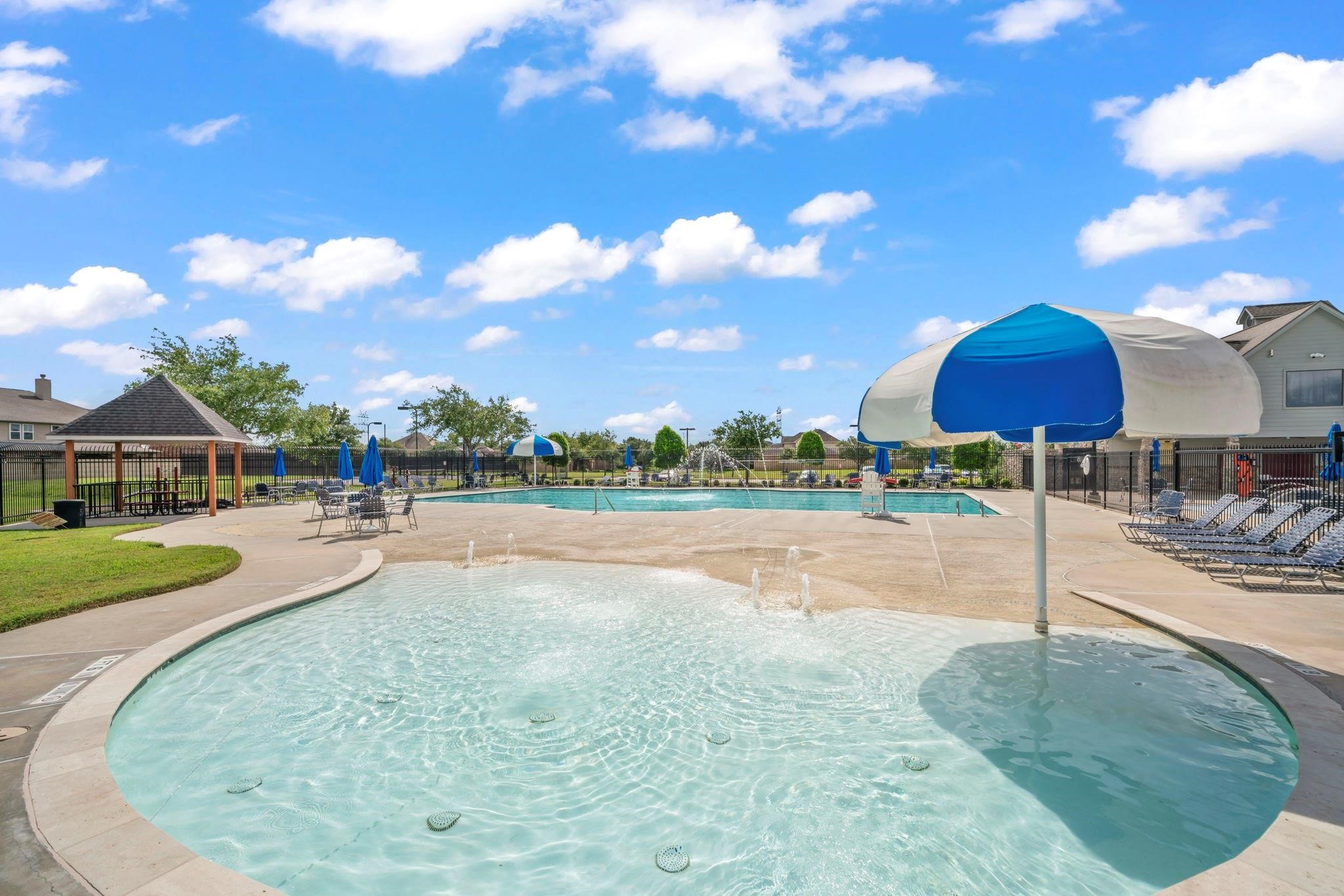 9939 Clear Diamond Drive Rosharon, TX 77583 - Photo 27 of 30 a view of a swimming pool with lounge chair
