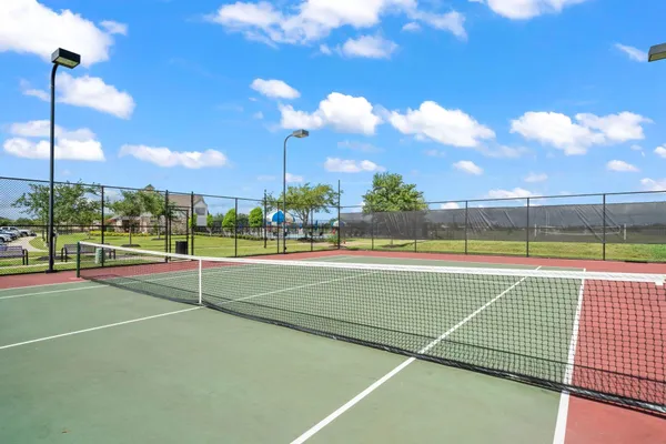 a view of entryway with wooden floor and stairs