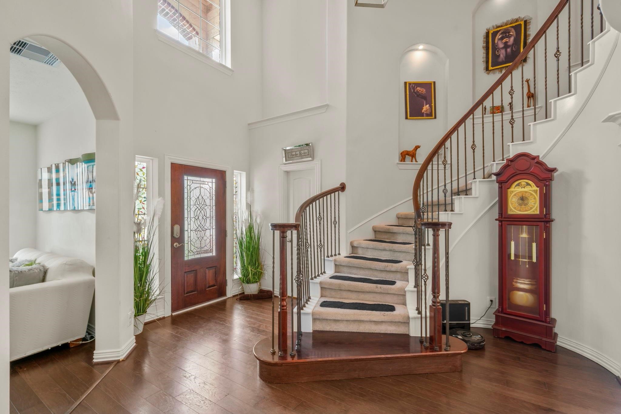 9939 Clear Diamond Drive Rosharon, TX 77583 - Photo 30 of 30 a view of entryway with wooden floor and stairs