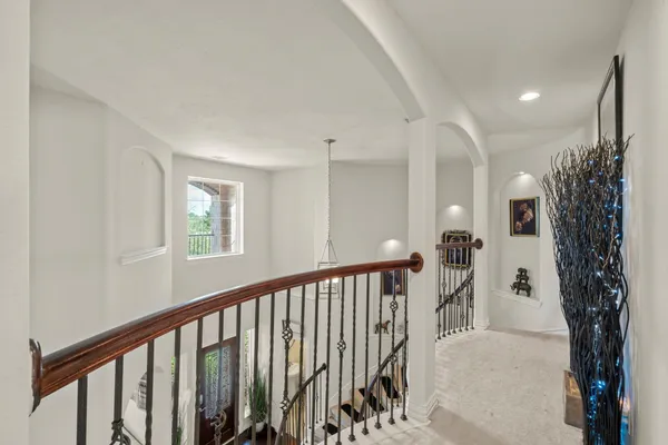 a view of a porch with a floor to ceiling window