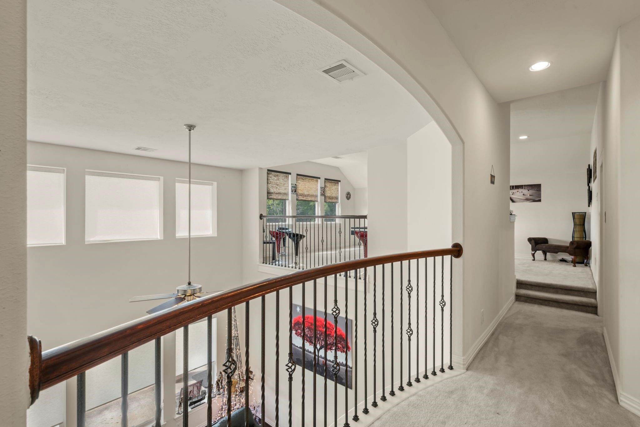 9939 Clear Diamond Drive Rosharon, TX 77583 - Photo 9 of 30 a view of a hallway with a living room