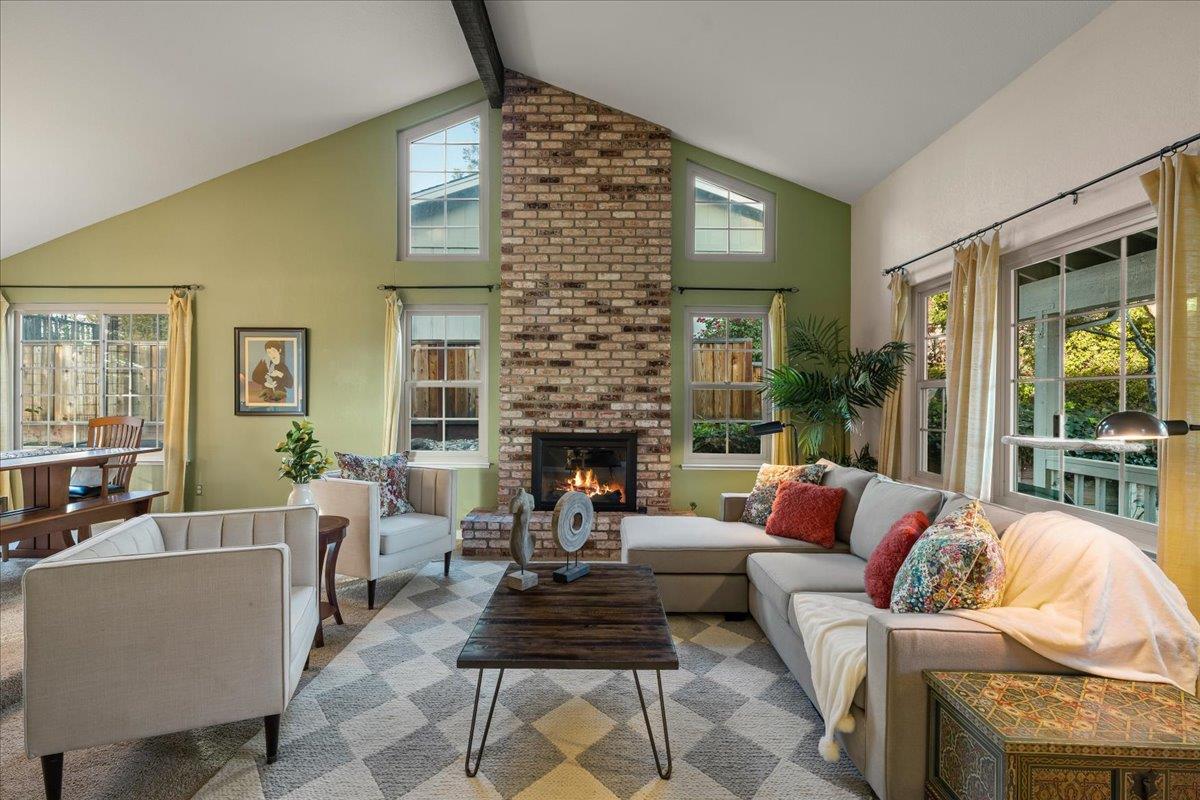 16715 Trail Drive Morgan Hill, CA 95037 - Photo 11 of 45 a living room with furniture fireplace and a large window