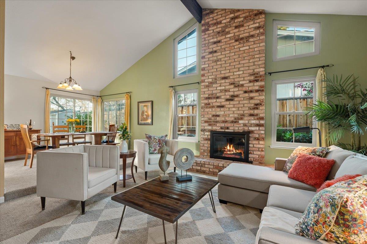 16715 Trail Drive Morgan Hill, CA 95037 - Photo 13 of 45 a living room with furniture potted plant and a fireplace