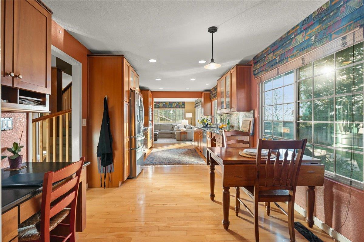 16715 Trail Drive Morgan Hill, CA 95037 - Photo 17 of 45 a view of a dining room with furniture window and wooden floor