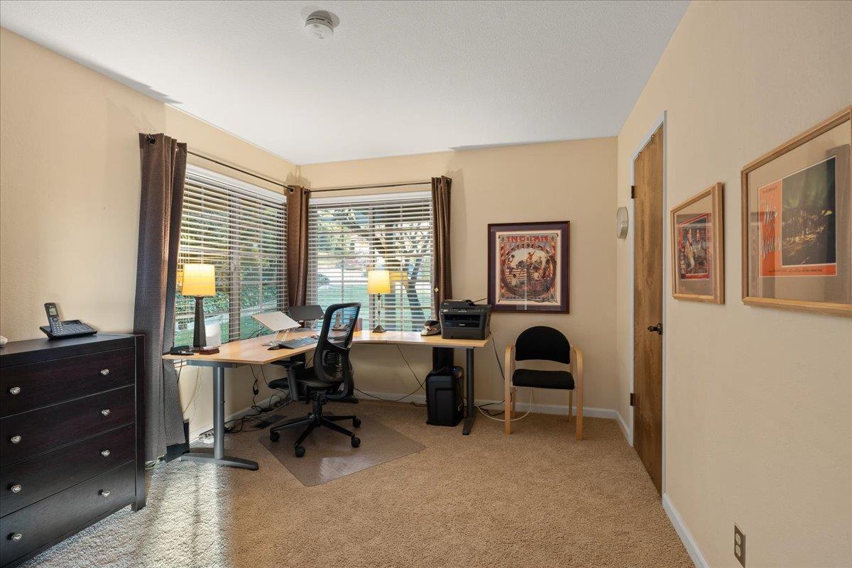16715 Trail Drive Morgan Hill, CA 95037 - Photo 23 of 45 a view of a livingroom with workspace and a window