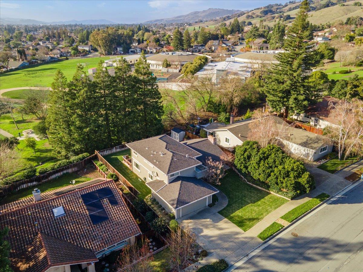 16715 Trail Drive Morgan Hill, CA 95037 - Photo 3 of 45 an aerial view of residential houses with outdoor space