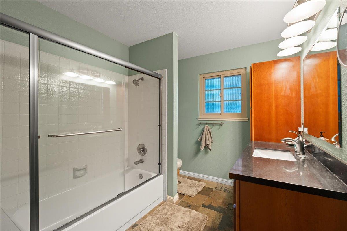 16715 Trail Drive Morgan Hill, CA 95037 - Photo 35 of 45 a bathroom with a shower and a sink