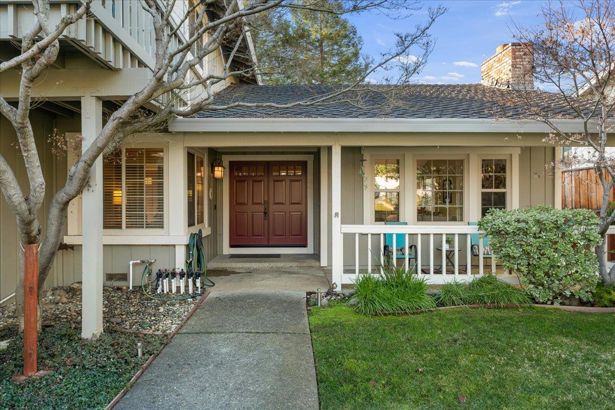 16715 Trail Drive Morgan Hill, CA 95037 - Photo 7 of 45 a front view of a house with a yard