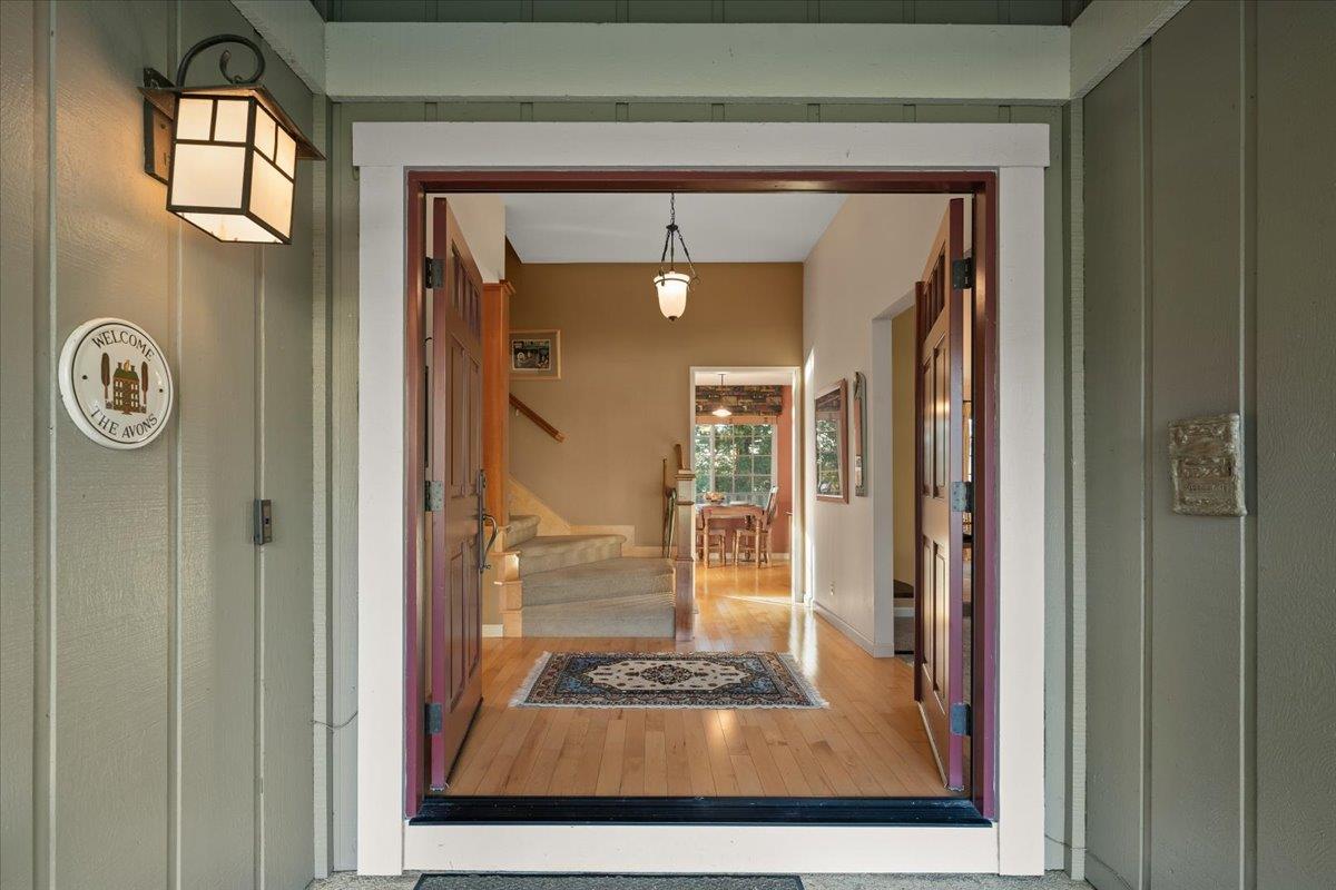 16715 Trail Drive Morgan Hill, CA 95037 - Photo 9 of 45 a view of a hallway with a door and a mirror
